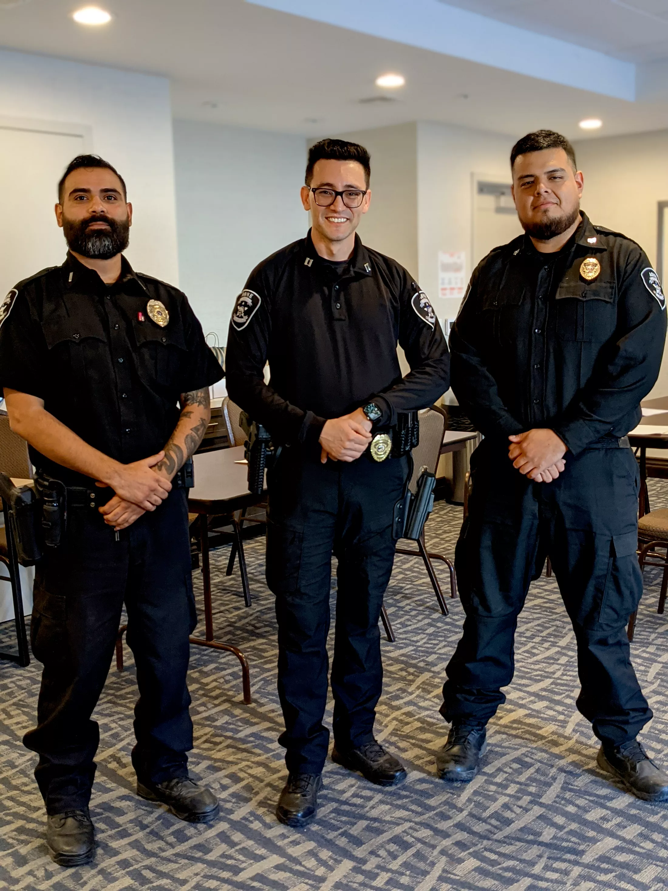Lieutenant, captain, and sergeant standing together in uniform